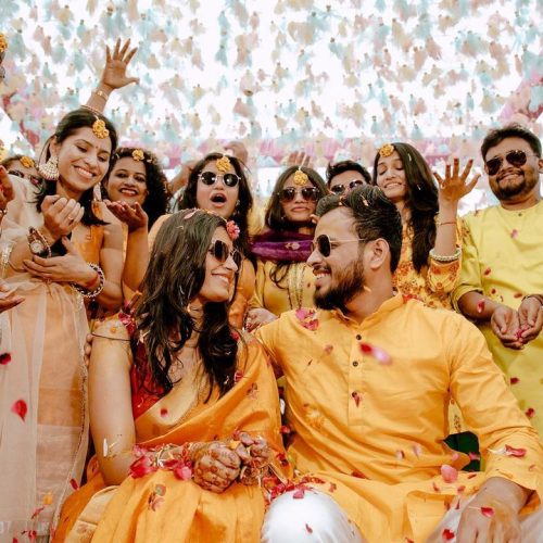 Haldi-photoshoot-poses-with-family-for-haldi-ceremony-photography